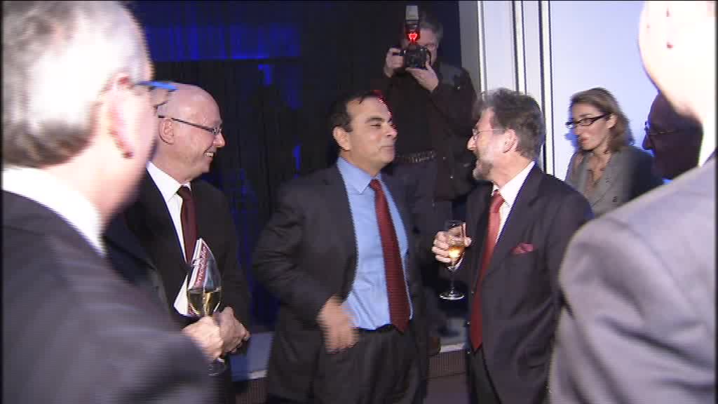 Nissan Motor Co. Ltd's President and CEO, Carlos Ghosn and guests arrive at CotY event in Paris; crowd scenes; event signage; guests take close look at LEAF
