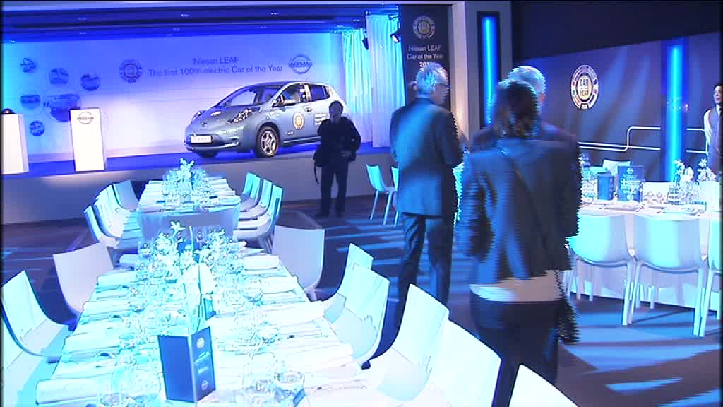 Guests at the LEAF CotY event dinner; Nissan Motor Co. LTD's President and CEO, Carlos Ghosn receives the CotY award from Hakan Matson, President of the Jury, Car of the Year; excerpts from Mr Ghosn's acceptance speech.